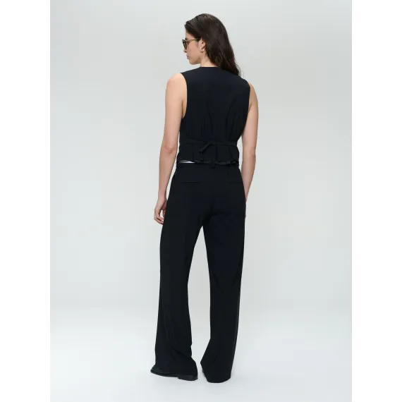 Jane Lushka.Antiny strech technical jersey pants. Black with white stripe