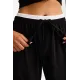 Jane Lushka.Antiny strech technical jersey pants. Black with white stripe