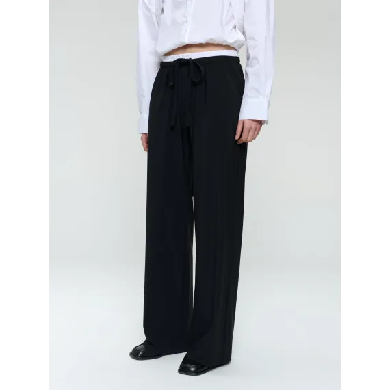Jane Lushka.Antiny strech technical jersey pants. Black with white stripe